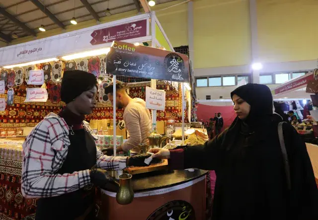 Woman selling coffee