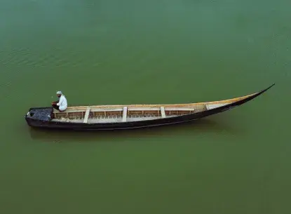 Iraqi fisherman in a boat
