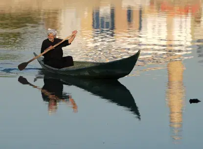 Man rowing in the Euphrates River