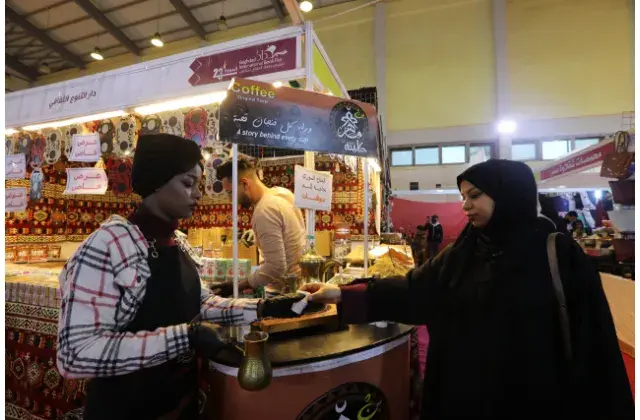 Woman selling coffee