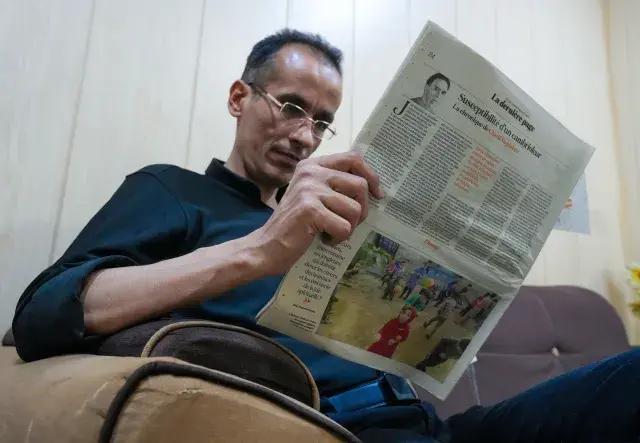 Man reading newspaper